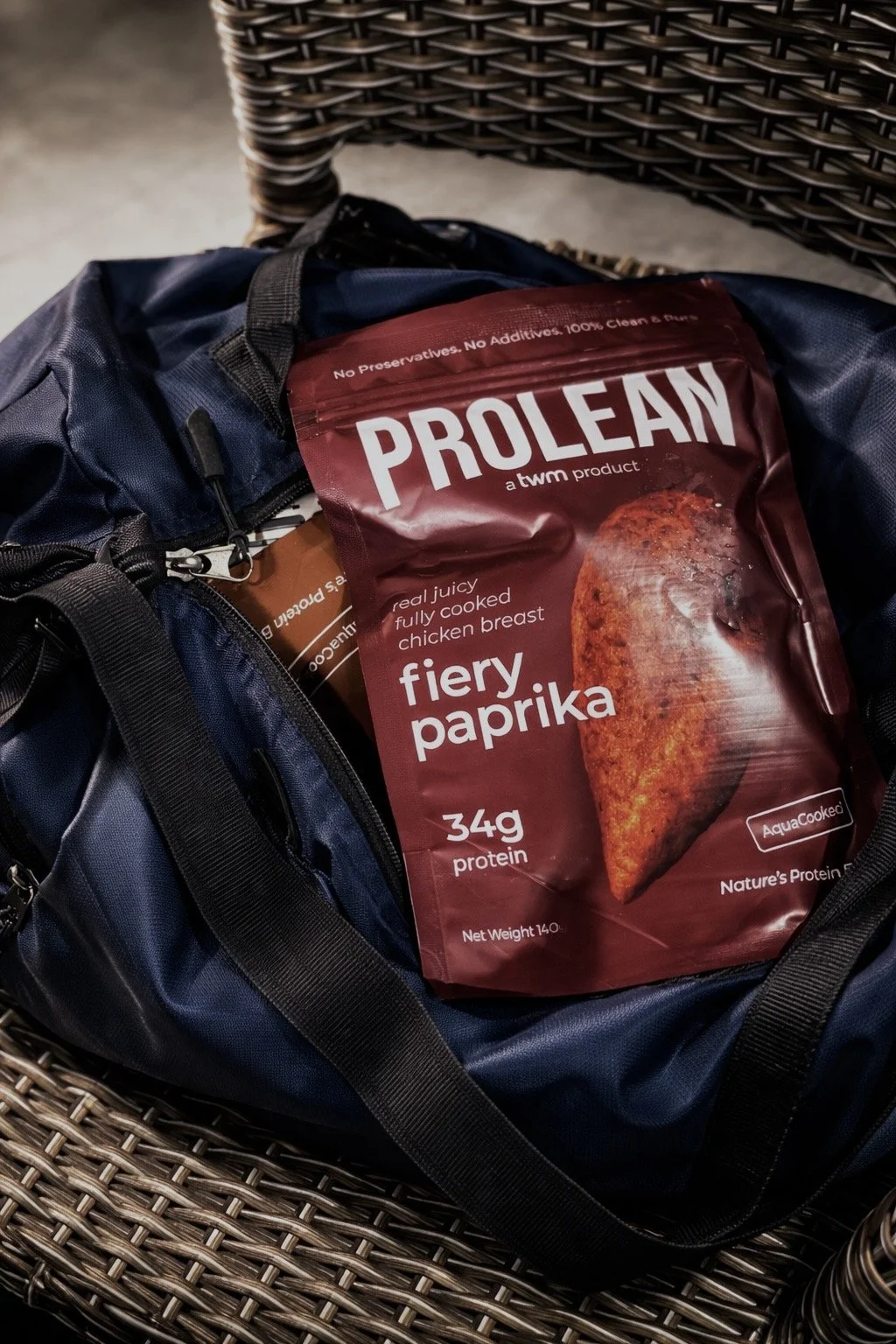 PROLEAN - India's first ready-to-eat chicken breast — 34g of real protein per 140g pack. Open and eat: post-workout, at your desk, or as a complete meal.